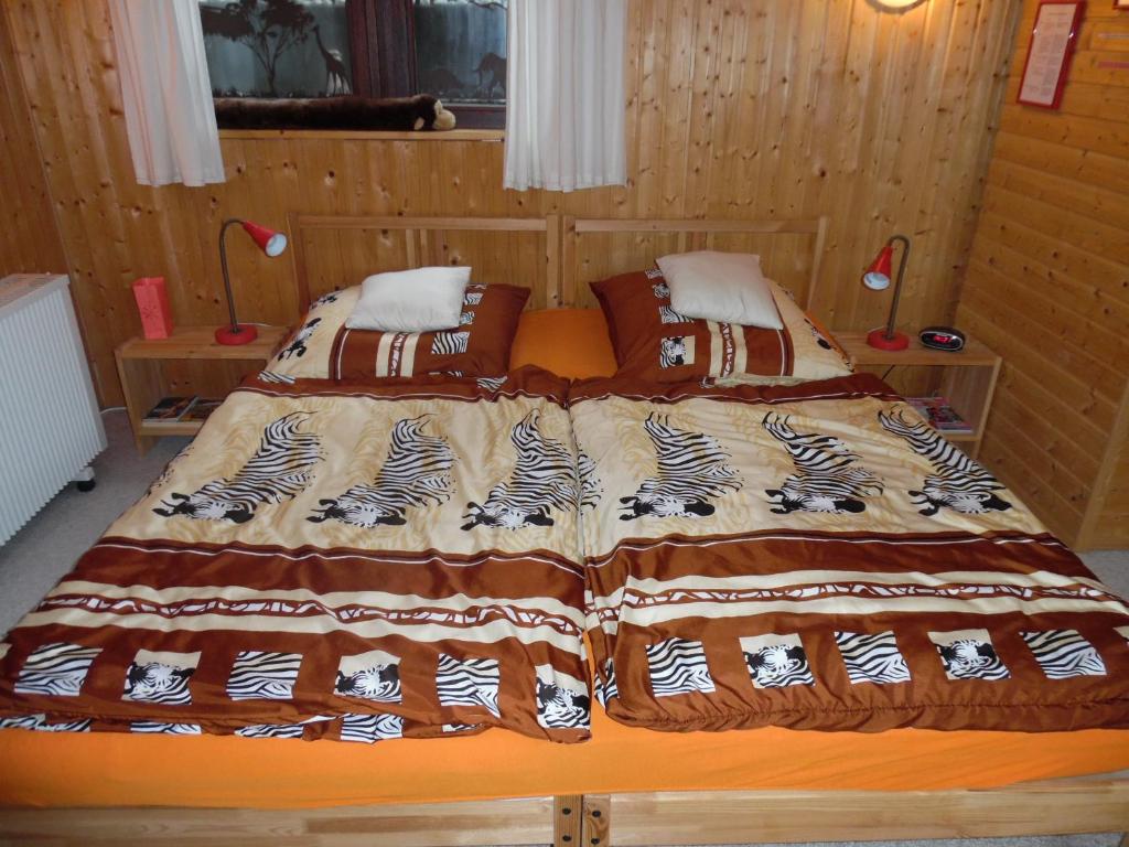 Postel nebo postele na pokoji v ubytování Haus Tsavo