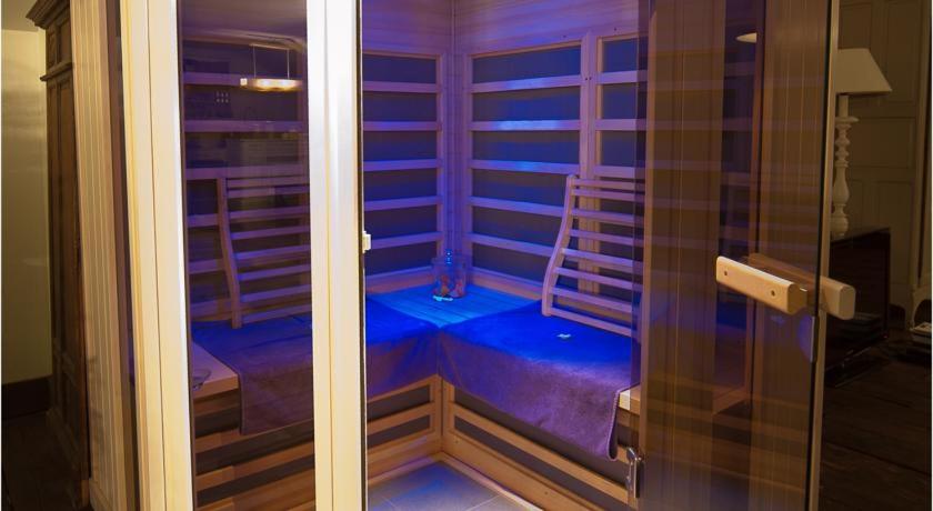 Postel nebo postele na pokoji v ubytování Thermes Oppidum