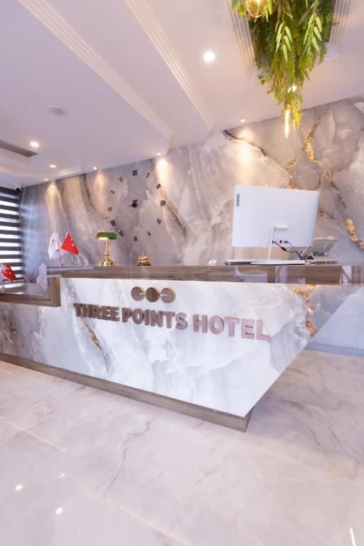 Certifikát, hodnocení, plakát nebo jiný dokument vystavený v ubytování Three Points Hotel