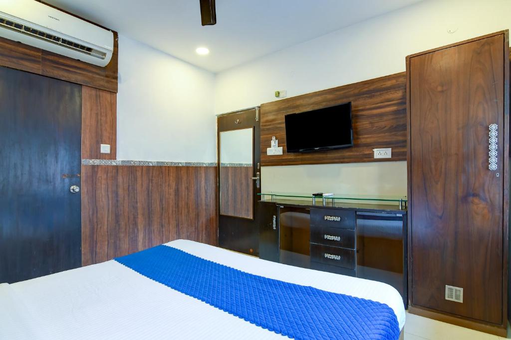 Postel nebo postele na pokoji v ubytování Hotel Q Inn