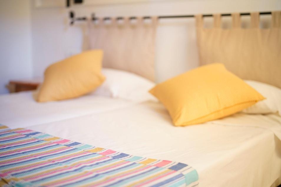 Postel nebo postele na pokoji v ubytování Hostal Yebisah