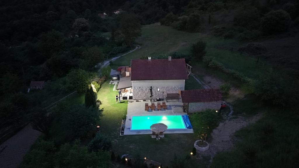an aerial view of a house with a swimming pool at Zelinjski vidikovac in Zvornik