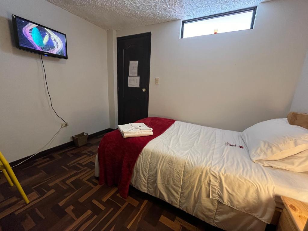Postel nebo postele na pokoji v ubytování St. Gallen Haus