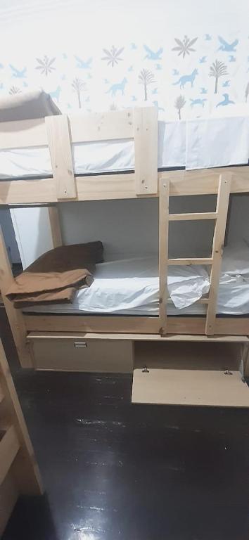 Postel nebo postele na pokoji v ubytování Quinoa Backpackers Hostel