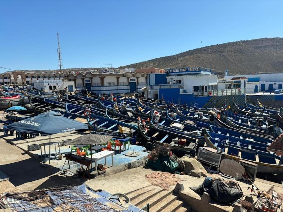 a bunch of boats are parked in a harbor at apartment vue Mer in Agadir