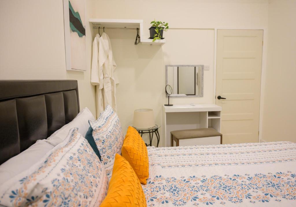 Postel nebo postele na pokoji v ubytování Tranquil Stay