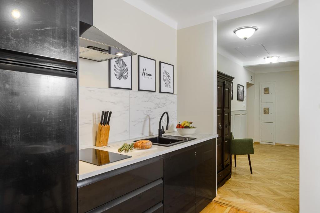 Kuchyňa alebo kuchynka v ubytovaní P&O Podwale Apartments