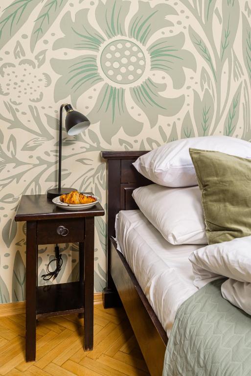 Posteľ alebo postele v izbe v ubytovaní P&O Podwale Apartments
