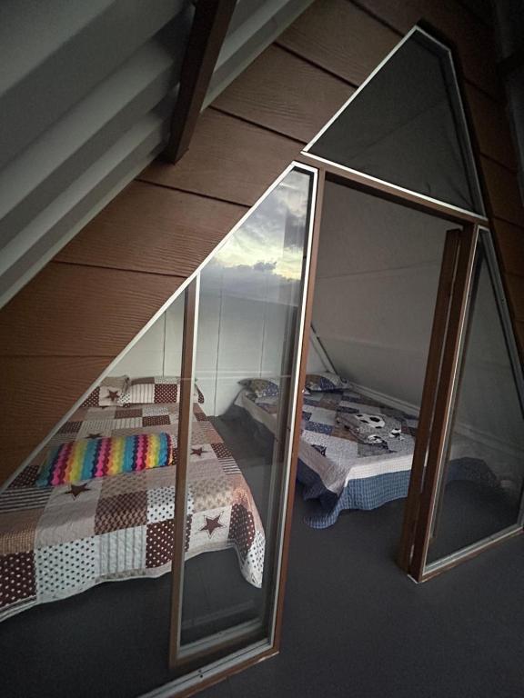 Postel nebo postele na pokoji v ubytování Glamping La Mardo