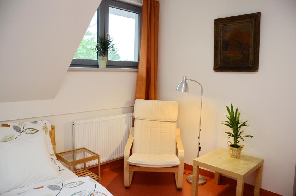 Postel nebo postele na pokoji v ubytování Mezi Stromy