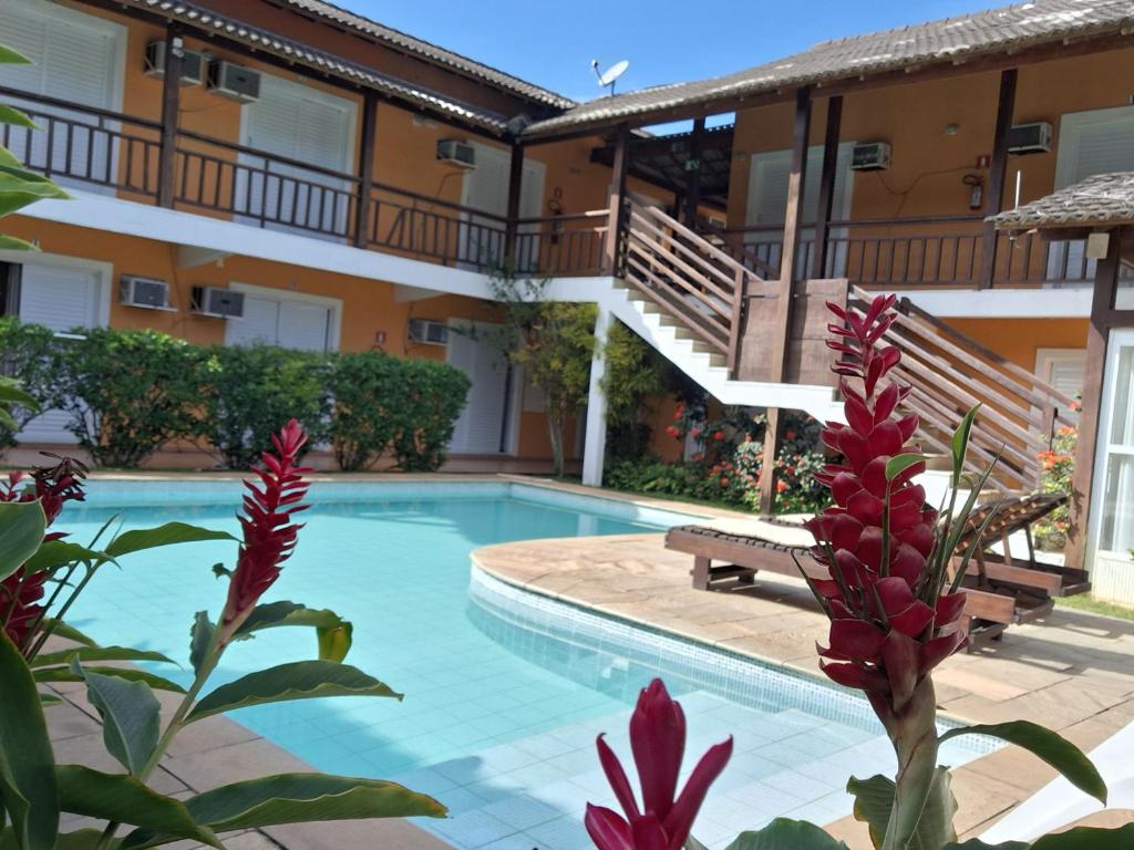 A piscina localizada em Pousada Rosa dos Ventos Juquehy ou nos arredores