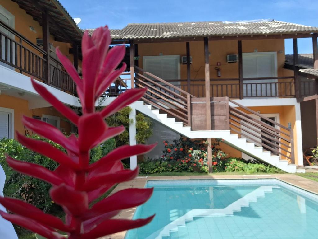 A piscina localizada em Pousada Rosa dos Ventos Juquehy ou nos arredores