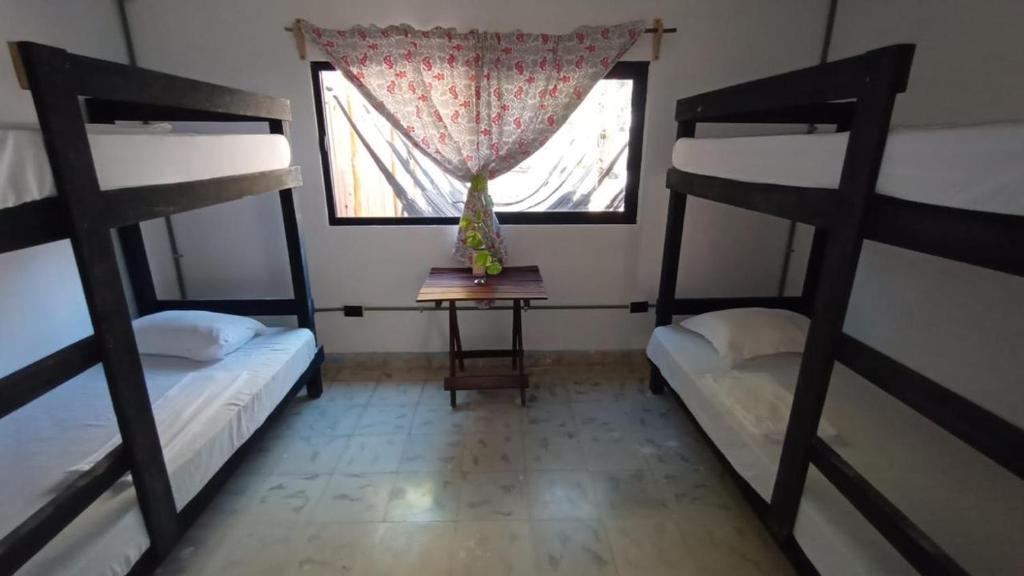 Poschodová posteľ alebo postele v izbe v ubytovaní Aventura Maya Hostel Y Camping - Holbox