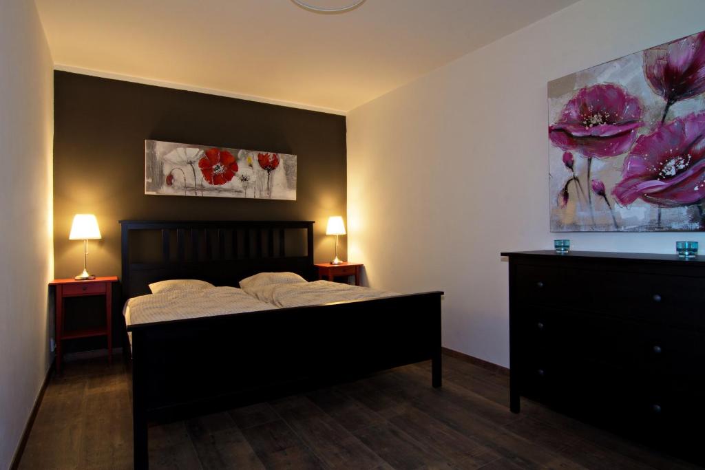Postel nebo postele na pokoji v ubytování Apartmány Chata Švadlenka