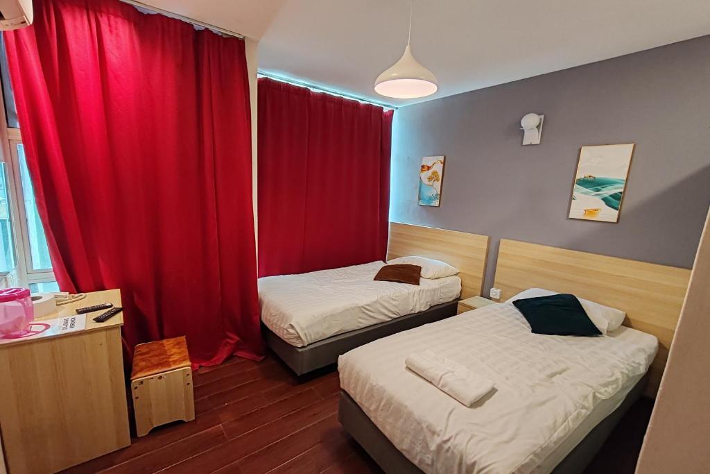 Postel nebo postele na pokoji v ubytování Hotel 18 DIMILIKI OLEH HOTEL MY HOME STATION 18 SDN BHD