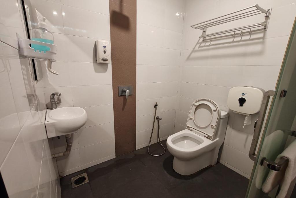 Koupelna v ubytování Hotel 18 DIMILIKI OLEH HOTEL MY HOME STATION 18 SDN BHD