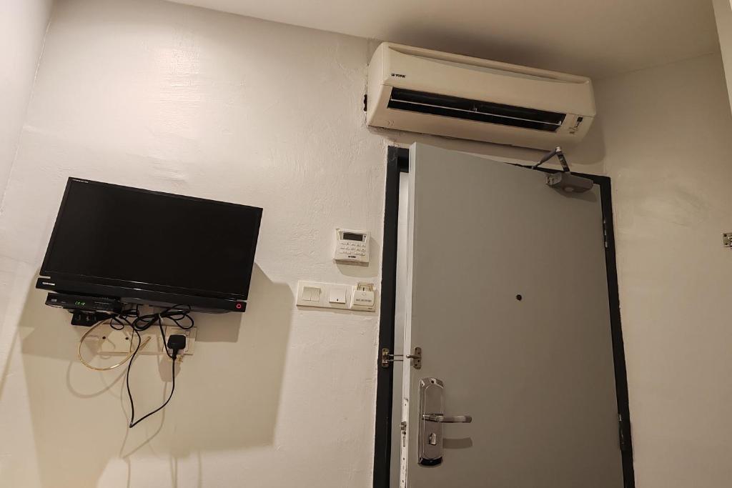 TV a/nebo společenská místnost v ubytování Hotel 18 DIMILIKI OLEH HOTEL MY HOME STATION 18 SDN BHD