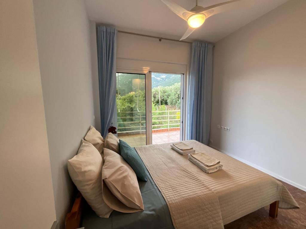 Ένα ή περισσότερα κρεβάτια σε δωμάτιο στο Holidays apartment near the beach