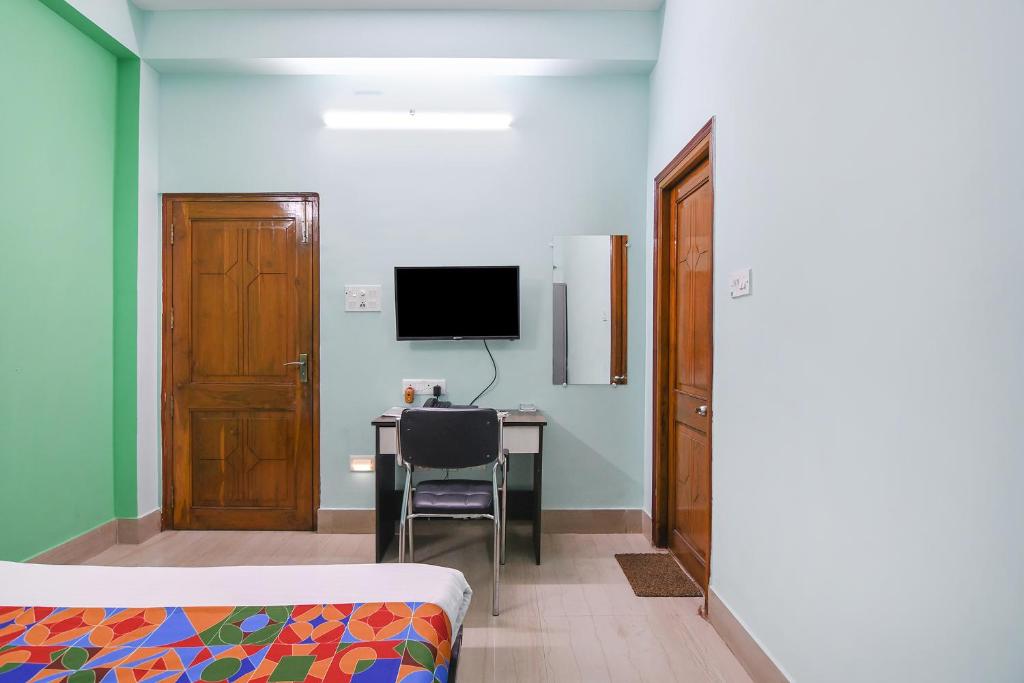 TV a/nebo společenská místnost v ubytování FabHotel Vicky