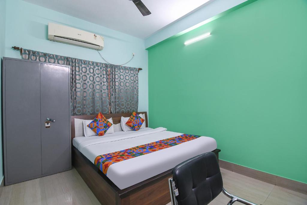 Postel nebo postele na pokoji v ubytování FabHotel Vicky