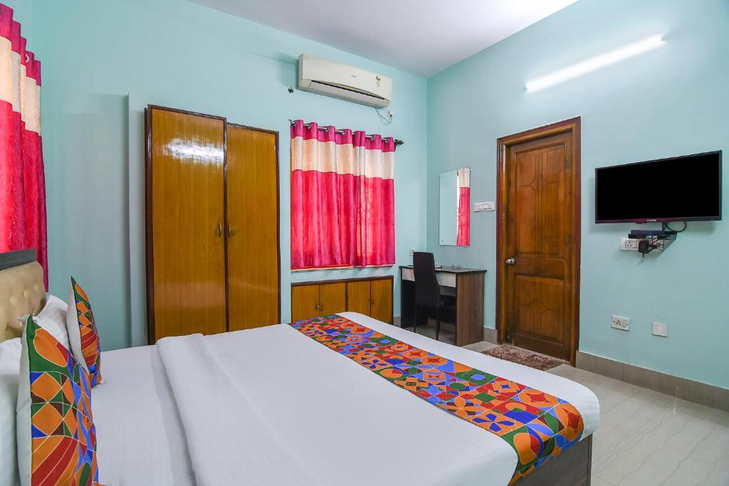 Postel nebo postele na pokoji v ubytování FabHotel Vicky