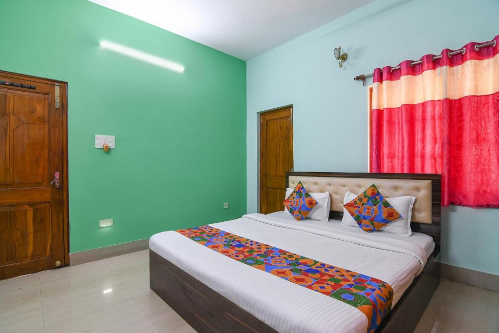 Postel nebo postele na pokoji v ubytování FabHotel Vicky