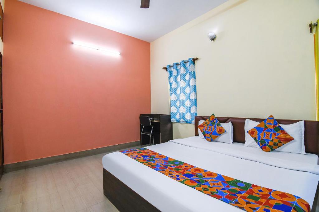 Postel nebo postele na pokoji v ubytování FabHotel Vicky