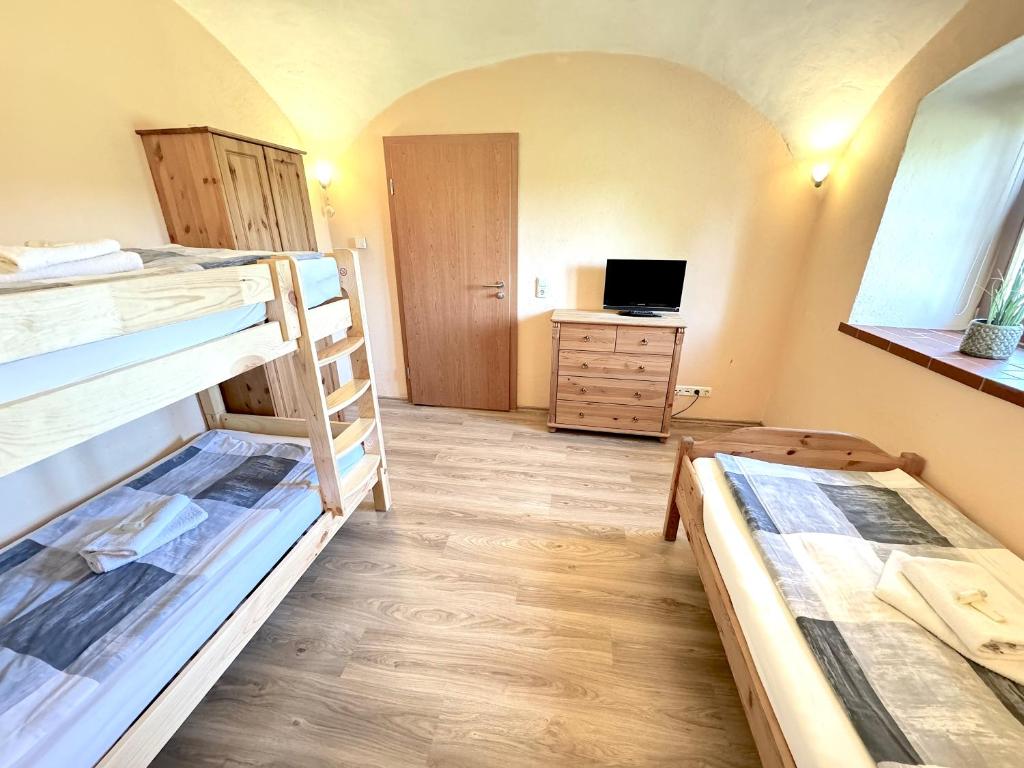 Postel nebo postele na pokoji v ubytování Pension Laurent Ranch