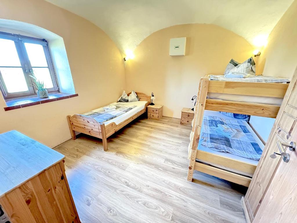 Postel nebo postele na pokoji v ubytování Pension Laurent Ranch