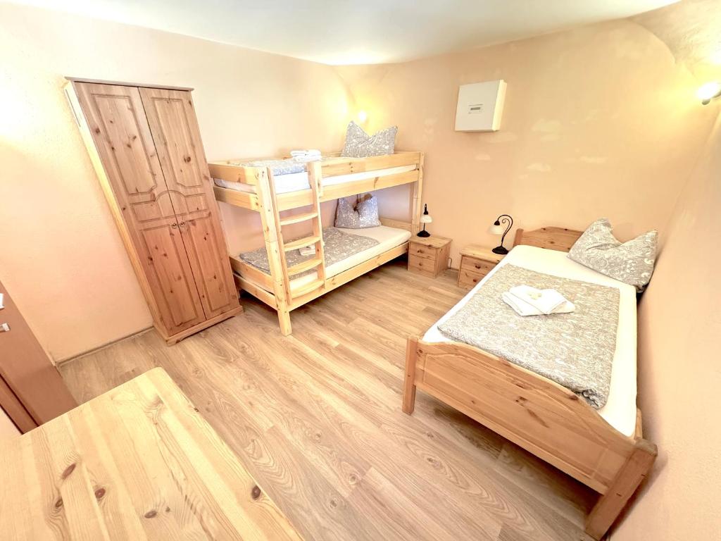 Postel nebo postele na pokoji v ubytování Pension Laurent Ranch