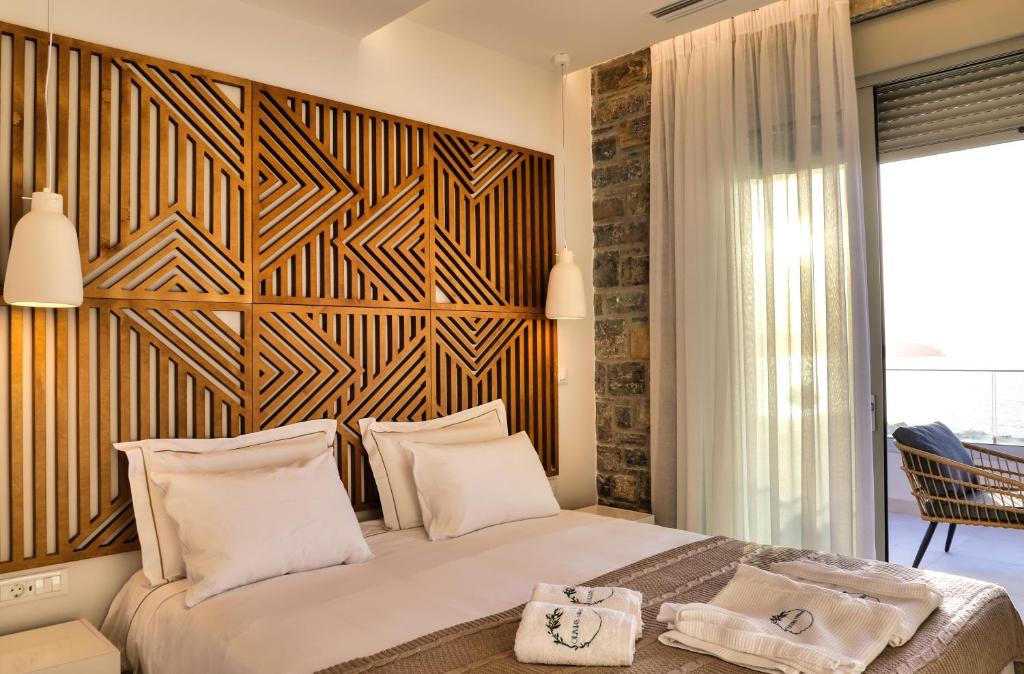 Postel nebo postele na pokoji v ubytování OLIVIA'S Villas