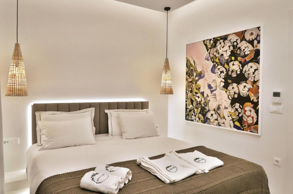 Postel nebo postele na pokoji v ubytování OLIVIA'S Villas