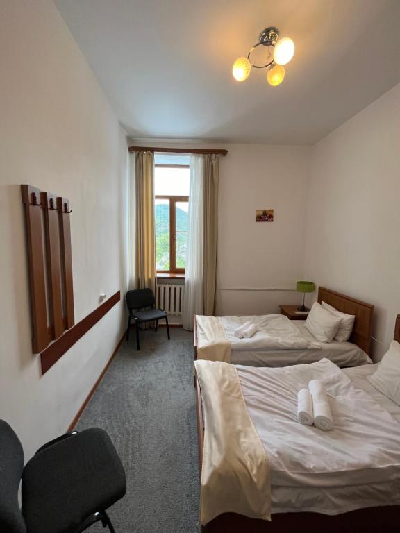 Postel nebo postele na pokoji v ubytování Diligence Hotel & restaurant