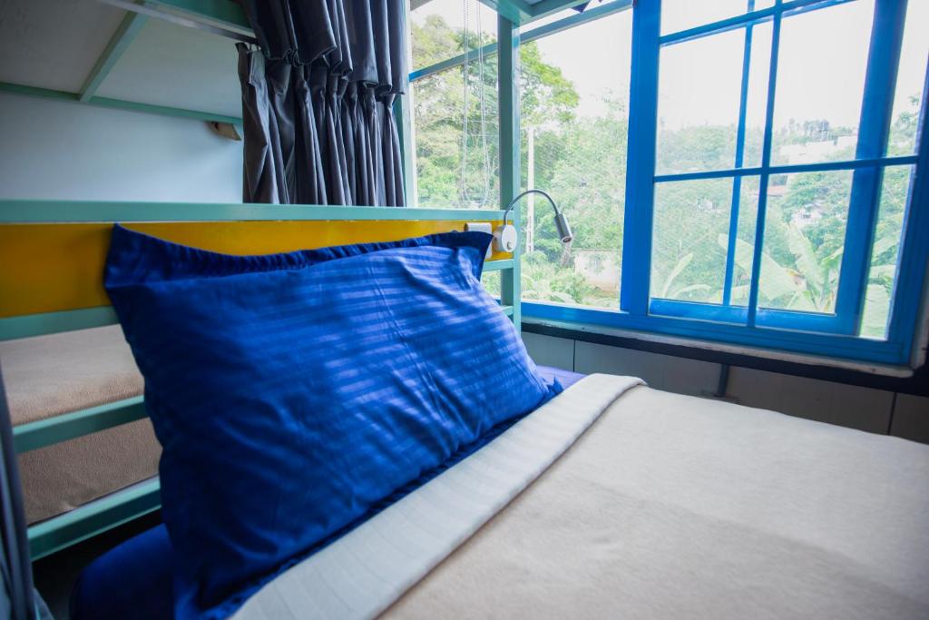 Postel nebo postele na pokoji v ubytování Hangover Hostels Ella