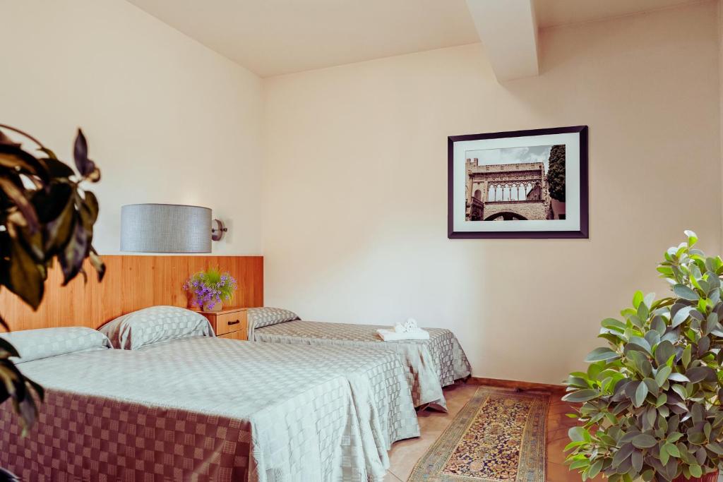 Posteľ alebo postele v izbe v ubytovaní Nazareth Residence
