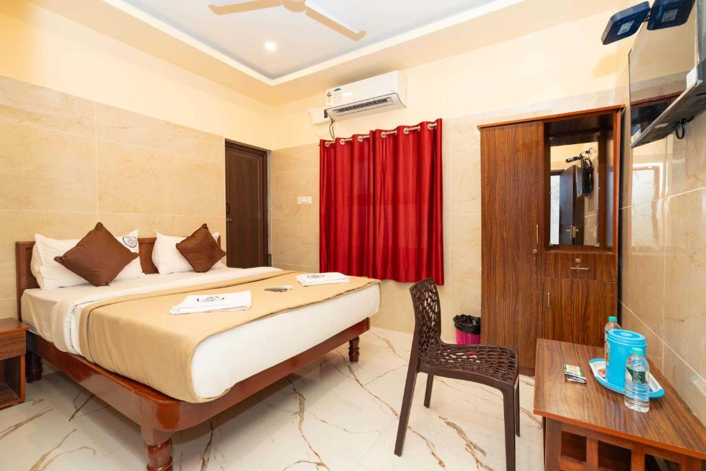 Postel nebo postele na pokoji v ubytování Amman Residency - Rameswaram