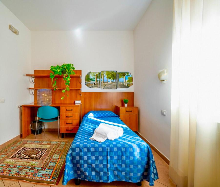 Posteľ alebo postele v izbe v ubytovaní Nazareth Residence