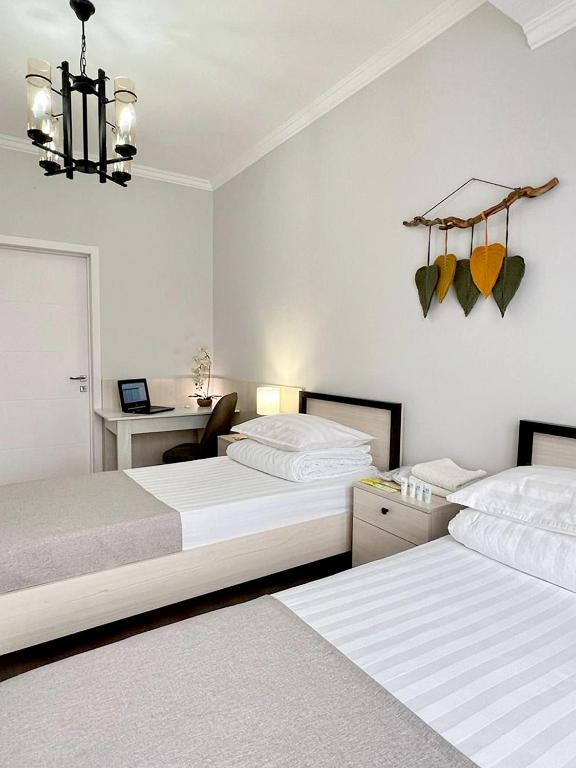 Postel nebo postele na pokoji v ubytování Compass Hostel