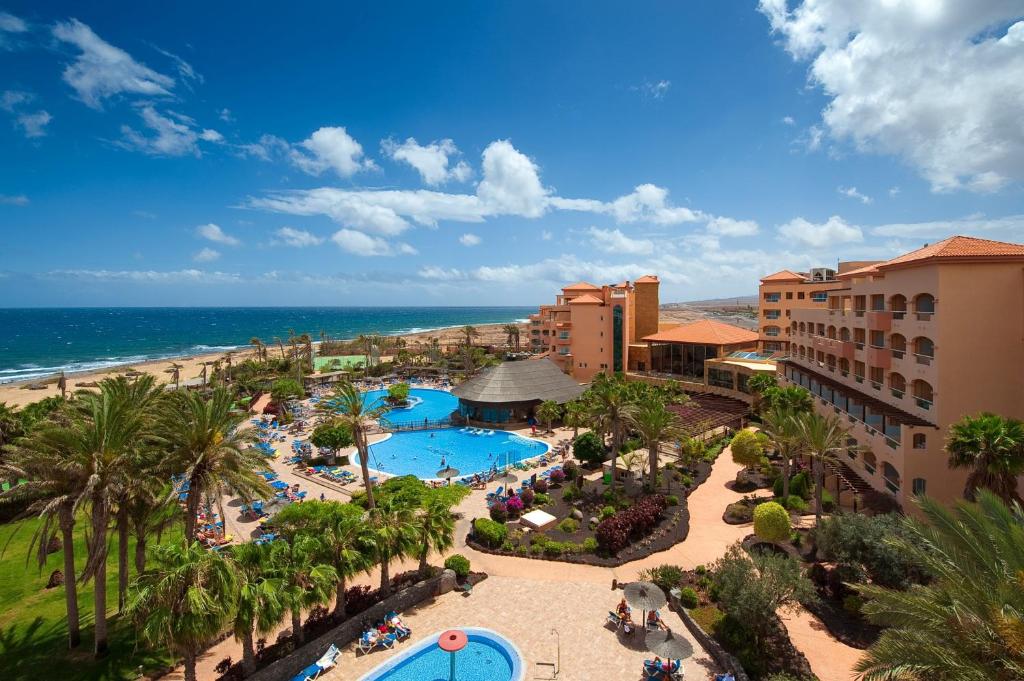 an aerial view of the resort and the beach at Elba Sara Beach & Golf Resort in Caleta De Fuste