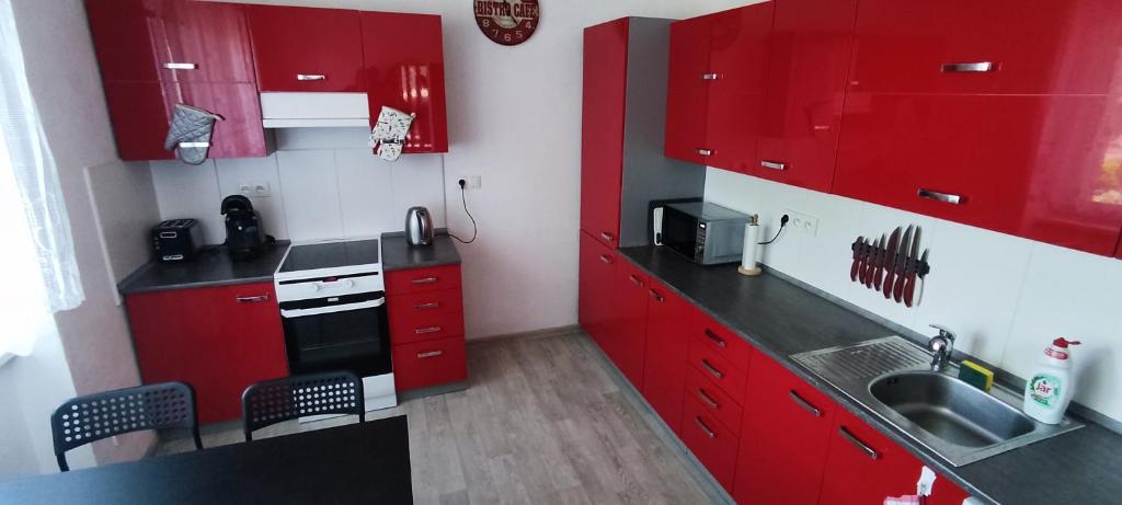 Kuchyň nebo kuchyňský kout v ubytování Cosy Room