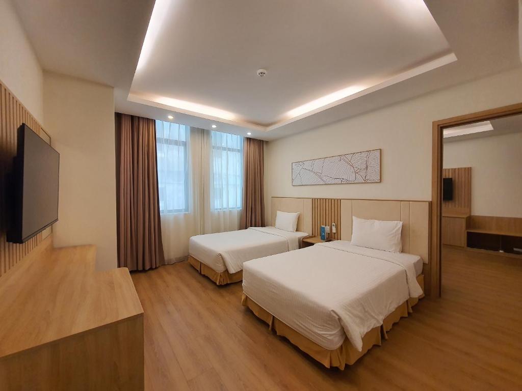 Muong Thanh Vung Tau Hotel - Deluxe Quadruple Room