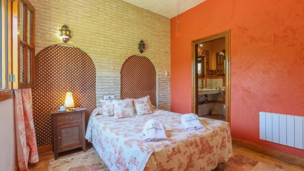 Postel nebo postele na pokoji v ubytování Casa Huerta El Fontanarillo Montemayor by Ruralidays