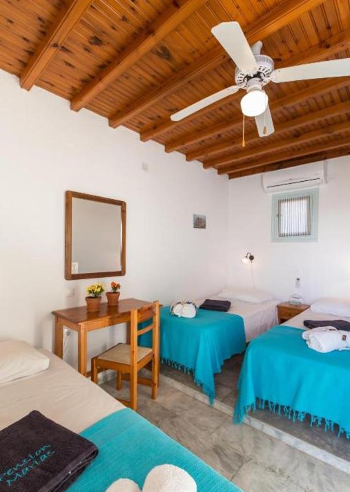 Postel nebo postele na pokoji v ubytování Pension Marias Sea View