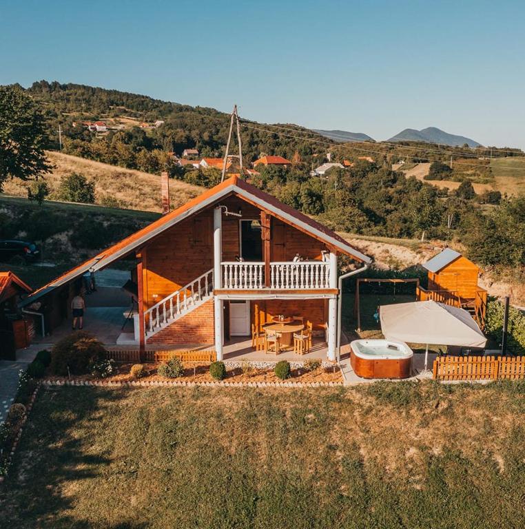 an overhead view of a house on a hill at Kuča za odmor Stina in Slavetić