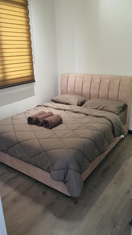 Postel nebo postele na pokoji v ubytování Kami Tami Japandi Poolview