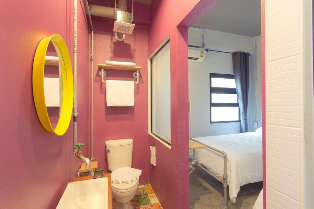 Postel nebo postele na pokoji v ubytování Bloo Hostel