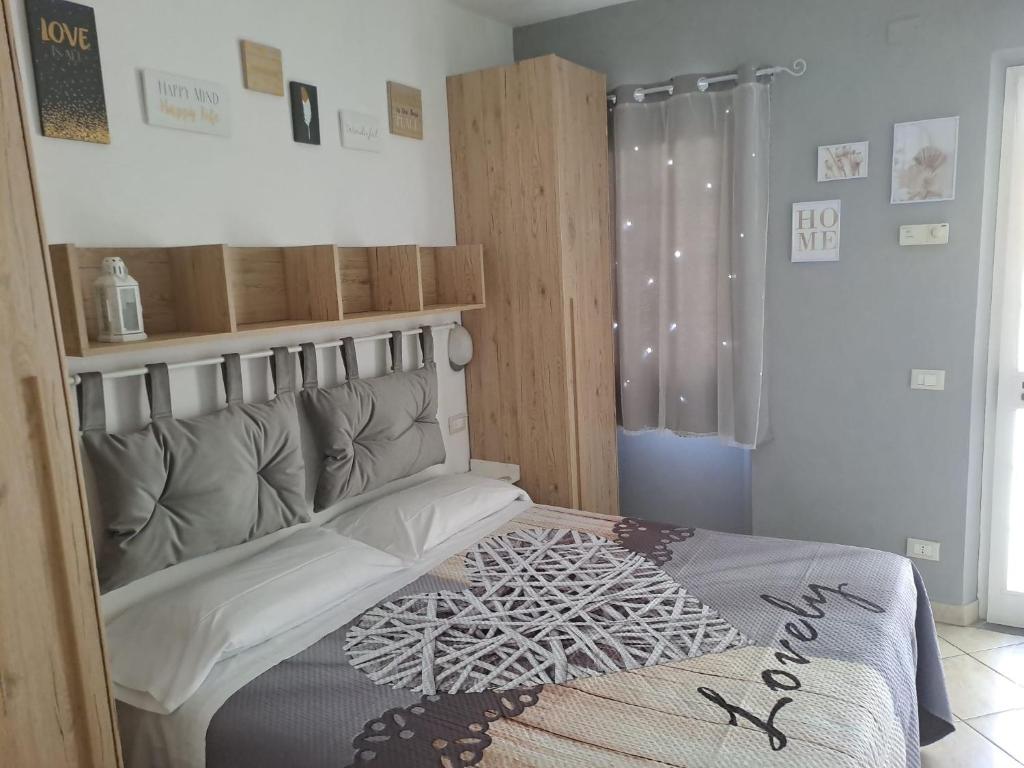 Postel nebo postele na pokoji v ubytování Hotel Mariani