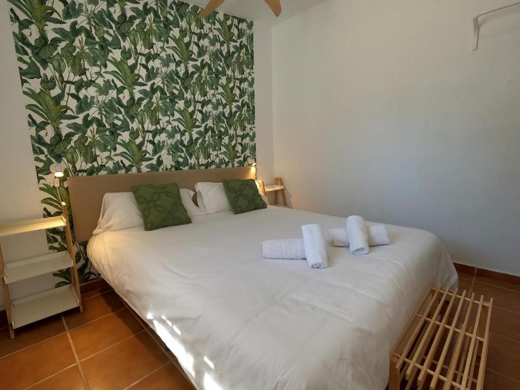 Posteľ alebo postele v izbe v ubytovaní Preciosa Villa Independiente 100metros playa 10personas, Free Parking, Fully renovated Now