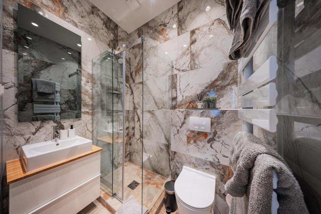 Un baño de TheWICKI 22 - Wunderschöne Apartments in Wien