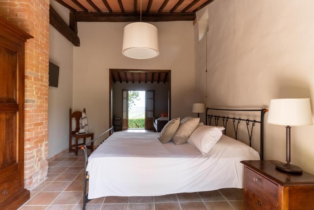 Postel nebo postele na pokoji v ubytování Tenuta Fattoria Vecchia